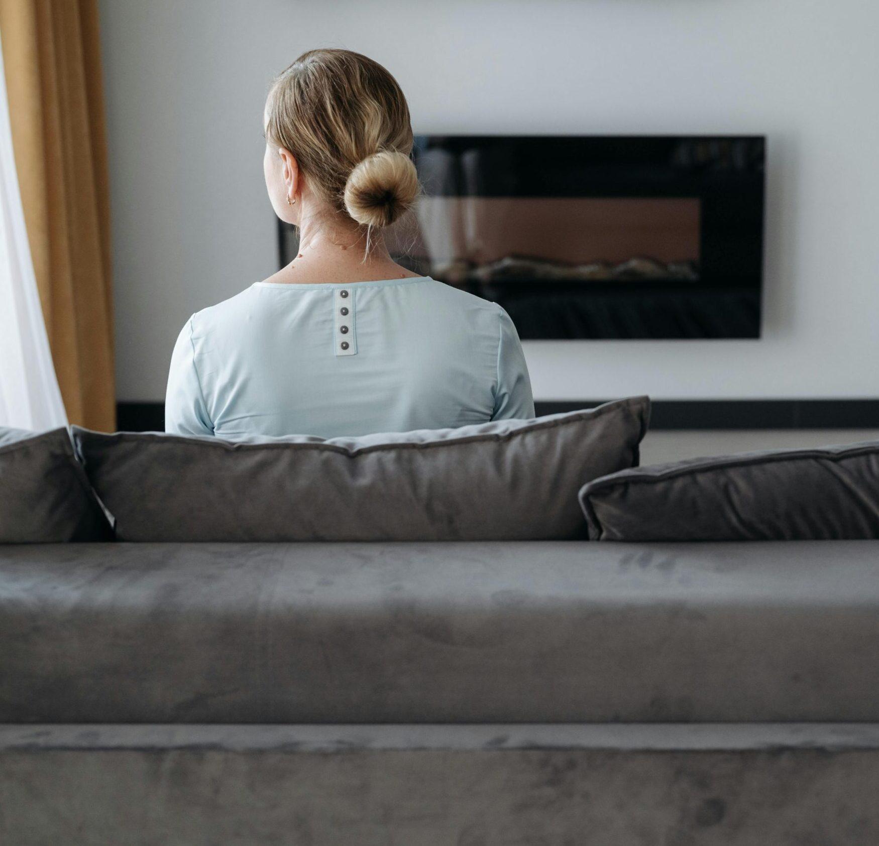 woman thinking on a couch
